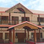 Sakleshpur's traditional-style homestay boasts wooden pillars, red tile roofs and an open courtyard.